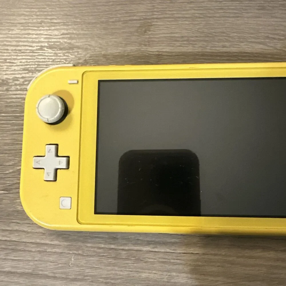 Nintendo Switch Lite Yellow Handheld Console Tested Works w/ microSD Card
